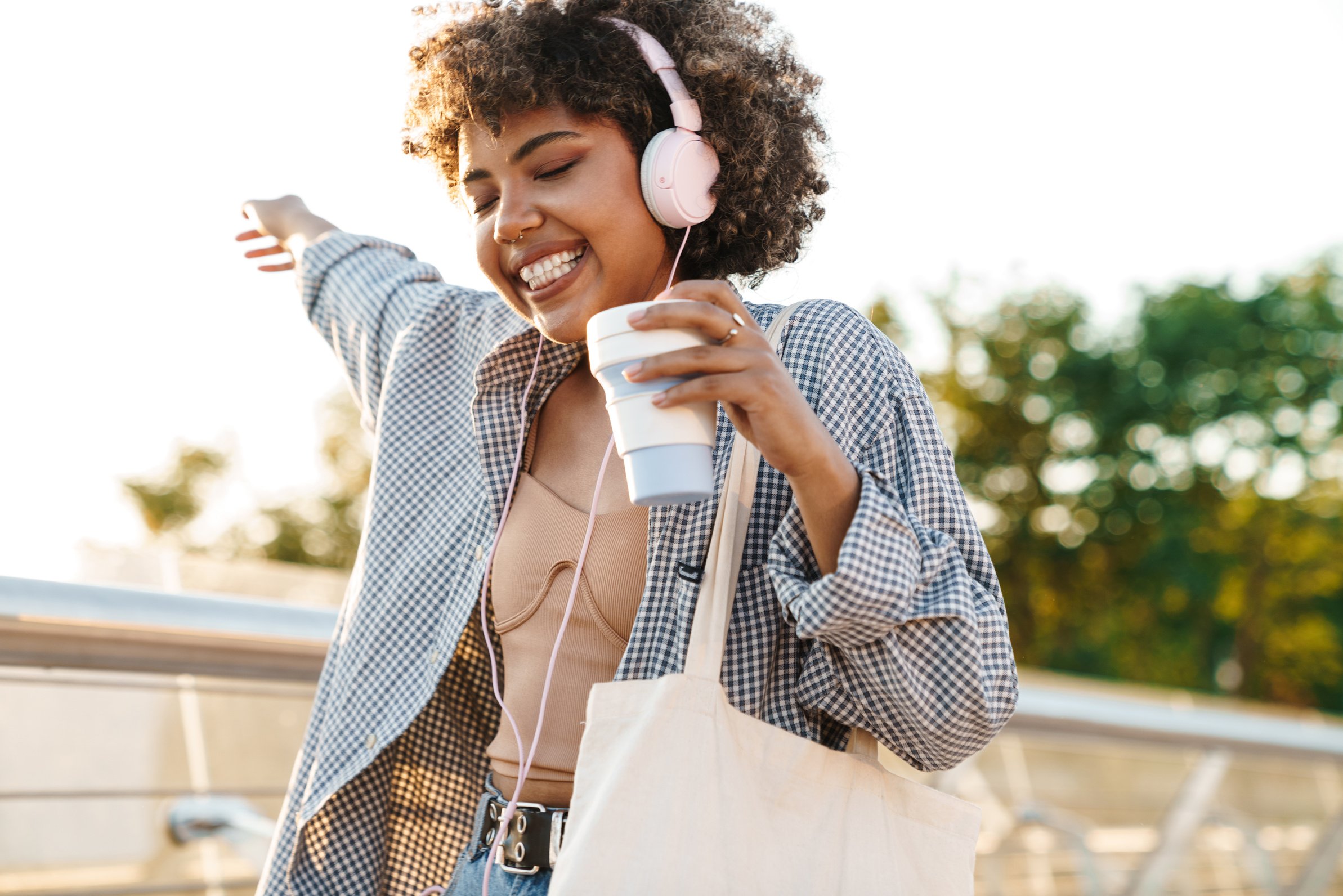 Happy Young African Woman Wearing Casual Clothing